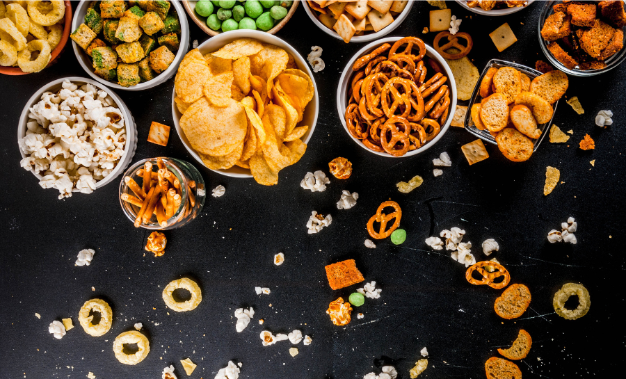 a bunch of bowls of snacks